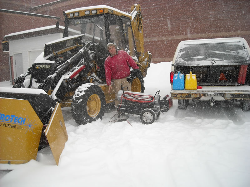 Commercial snow removal equipment in action